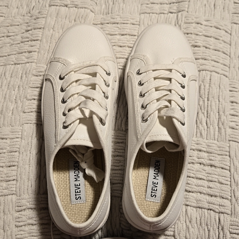 White leather Steven Madden platform sneakers.